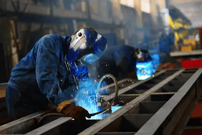 Evans welder joining a fabricated steel frame with MIG welding