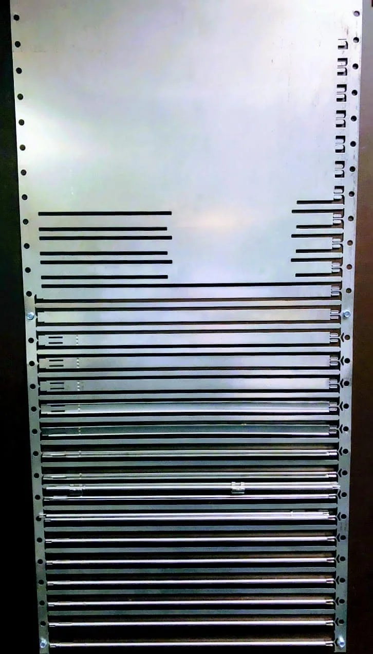 Progressive metal stamp progression over 20 hits on a surgical instrument Progressive metal stamp progression over 20 hits on a surgical instrument